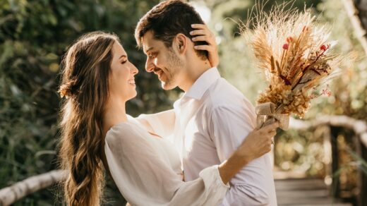 bride and groom embracing outdoors