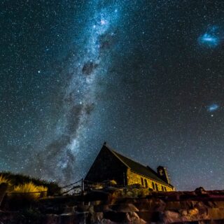 brown and green house under clear night sky