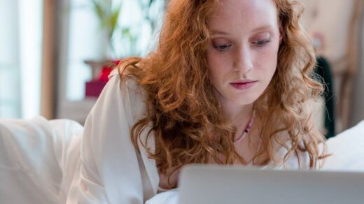 a woman using her laptop