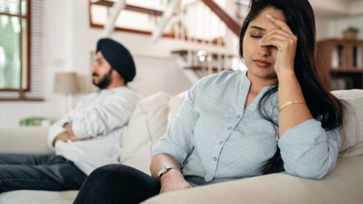 upset young indian couple after conflict