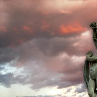 woman statuette during golden hour