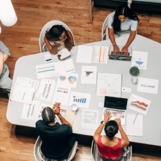 people in the office discussing a project