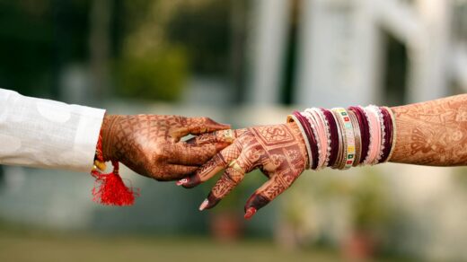 traditional indian wedding henna hands holding