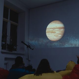 children watching astronomy projection