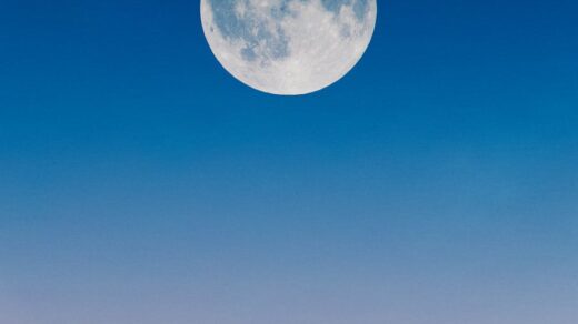 full moon on a blue sky