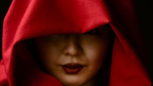 mysterious woman in red hood portrait