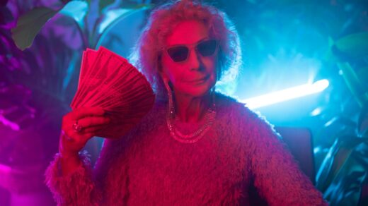 photo of an elderly woman flaunting money