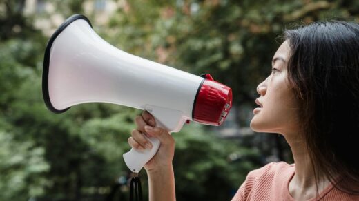 woman holding a megaphone
