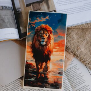 illustration of a lion lying on books
