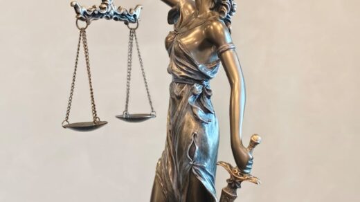 elegant bronze lady justice statue with sword