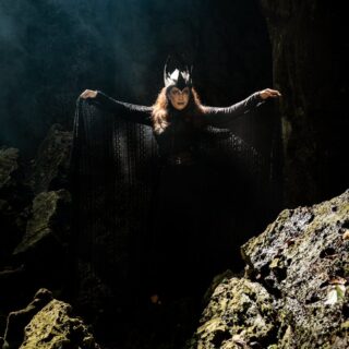 mysterious woman in enchanted forest cave