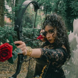 elegant latina cupid with bow and roses