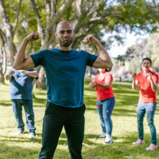 man flexing his muscles